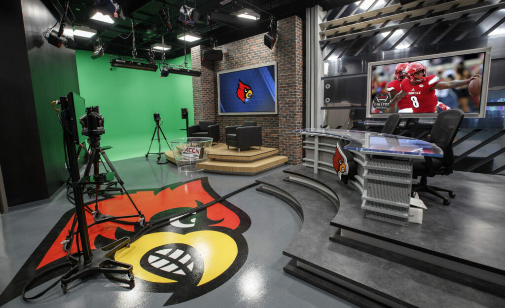 ACC, ACC Network, AJP, Anthony James Partners, AV Consulting, Broadcast, Broadcast Studio, College Sports, Distributed TV, edit suites, ESPN, production control room, Video Replay, University of Louisville, Cardinal, UofL, UofL Broadcast Center, AV Consultant, A/V consultant, Owner’s Representative, scoreboard, LED displays, Broadcast Cabling, Infrastructure Cabling, Control Room, NCAA, College Basketball, College Football, Atlantic Coast Conference, ESPN, ACC, intercollegiate, fiber connection, ESPN, ESPN2, ESPNU, ACC Network, 7,850 square foot production facility